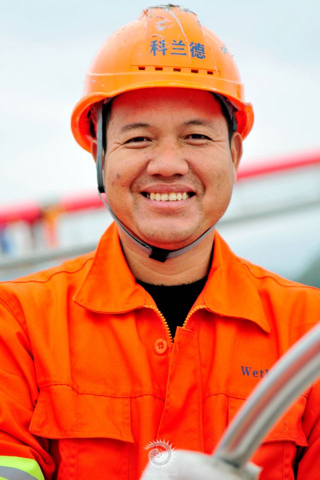 劳动者“笑脸墙”（摄于兴义环城高速建设工地）